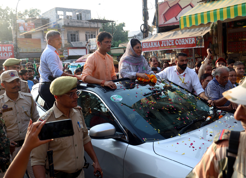 Mehbooba Mufti leading road show in Jammu city on Wednesday in support of PDP candidate. | |JK Assembly Elections images