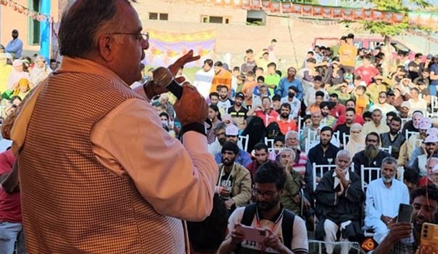 BJP National general secretary and incharge, J&K affairs, Tarun Chugh addressing a public meeting at Naid Khai in Bandipora in favor of party candidate Naseer Ahmed Lone.