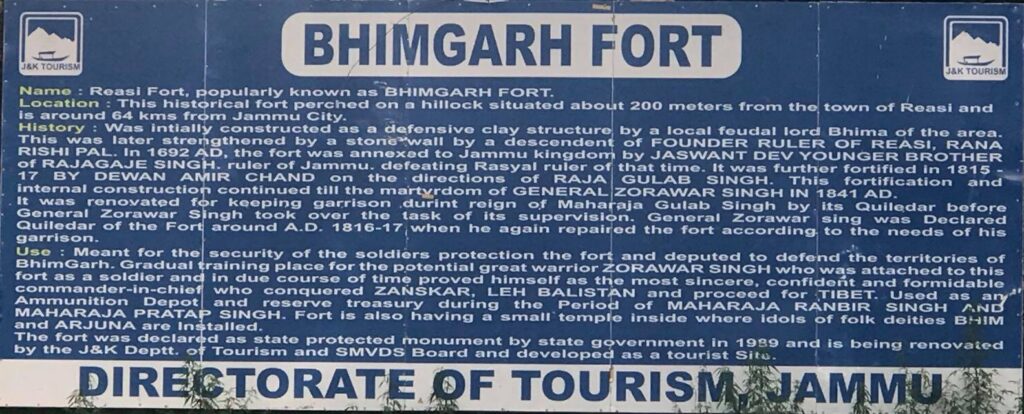 The information sign for the Bhimgarh Fort in Reasi explains some of its history.